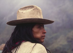 COLOMBIA, Santa Marta, Sierra Nevada , "Ica Indian chewing coca, wearing a hat and looking to his