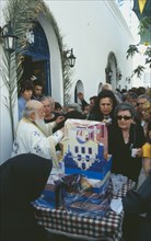 GREECE, Cyclades Islands, Santorini, Akrotiri. Annual Festival of Ayios Epiphanios. Congregation