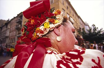 CROATIA, Kvarner, Rijeka, "Habsburg jubilee, woman in traditional hat. The streets of Rijeka are a