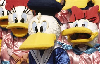 CROATIA, Kvarner, Rijeka, "Mask carnival, Donald and Daisy duck masks The Masked carnival (Maskare)