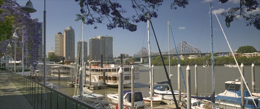 AUSTRALIA, Queensland, Brisbane, "Pleasure boats moored on the Brisbane River, with the Kookaburra