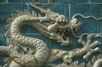 CHINA, Hebei, Beijing, Bei Hai Park. A gold dragon screen.