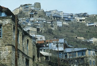 RUSSIA, Dagestan, Koubachi, Village housing on steep hillside.