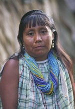 VENEZUELA, Orinoco Delta, "Warao Indian woman, wearing many beaded necklaces."
