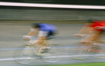 SPORT, Cycling, Men in bike race in motion blur.