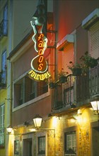 PORTUGAL, Lisbon, Illuminated neon sign in the Bairro Alto advertising Fado a musical genre