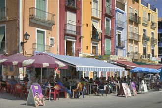 SPAIN, Costa Blanca, La Vila Joiosa, Colourful cafes near the beach.