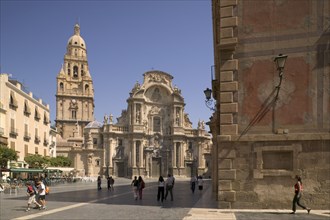 SPAIN, Murcia, Cathedral de Santa Maria and Plaza del Cardenal Belluga with people walking past.