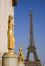 FRANCE, Ile de France, Paris, Gilded bronze statues in the central square of the Palais de Chaillot