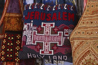 ISRAEL, Jerusalem, Old City. Detail of a handmade tourist bag decorated with the words Jerusalem