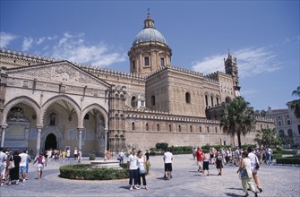ITALY, Sicily, Palermo, II Duomo Cathedral exterior with visitors walking around the complex