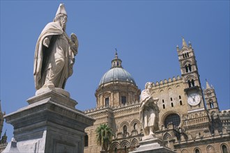 ITALY, Sicily, Palermo, II Duomo Cathedral exterior with religious statues and section of domed