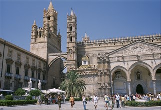 ITALY, Sicily, Palermo, II Duomo Cathedral exterior with visitors walking around the complex
