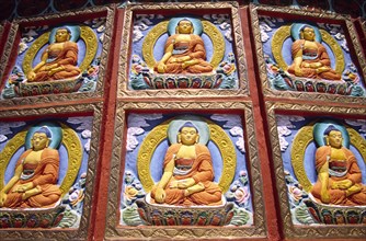 INDIA, Ladakh, Leh, "Shanti Stupa Buddhist reliefs. Leh's most prominent Buddhist landmark is a
