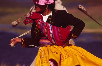 PERU, Puno Administrative Department, Lake Titicaca, "Aymara dancer dressed in her traditional