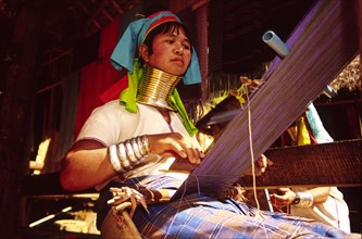 THAILAND, North, Mae Hong Son, "Nai Soi Long neck Karen woman weaving. Nai Soi near the Thai border
