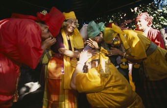 THAILAND, Chiang Mai, Sect of Spirit Worshippers at prayer and receiving blessing.