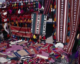 KUWAIT, Kuwait City, Bedouin woven textiles for sale at the Friday Market or souq.