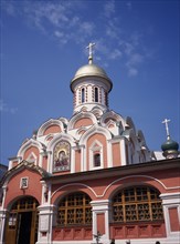 RUSSIA, Moscow, "Part view of exterior of refurbished church with red and white painted facade,
