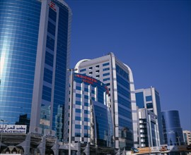 UAE, Dubai, Dubai Concorde Hotel and Residence on Al Maktoum Road.  Modern glass fronted exterior