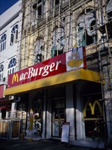 MYANMAR, Yangon, Exterior of Macburger fast food restaurant.