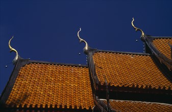 THAILAND, North, Chiang Mai, Temple roof detail.