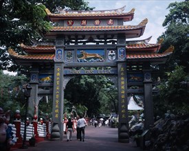 SINGAPORE, Haw Par Villa, Entrance to Haw Par Villa and Tiger Balm Gardens with people walking