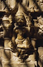 INDIA, Rajasthan, Jaisalmer, Carved Hindu iconography in Jain temple in Old City.  Close view