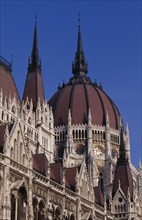 HUNGARY, Budapest, Part view of domed roof and exterior facade of Parliament building. Eastern