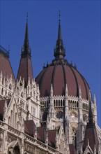 HUNGARY, Budapest, Part view of domed roof and exterior facade of Parliament building. Eastern