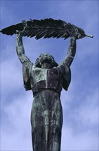 HUNGARY, Budapest, Soviet Liberation Monument on Gellert Hill. Detail of female figure holding