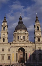 HUNGARY, Budapest, Basilica of St Stephen.  Exterior facade with domed roof and twin bell towers.