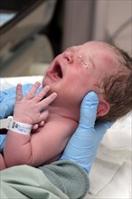 CHILDREN, Babies, Birth, "Kylan Stone, newborn baby girl crying, being checked by nurse in hospital