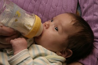 CHILDREN, Babies, Newborn, Kylan Stone drinking from bottle.