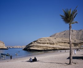 OMAN, Muscat, "Bandar Jissah beach near Al-Bustan Hotel just outside the capital city.  People at