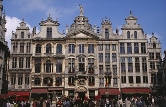 BELGIUM, Brabant, Brussels, Grand Place.  Crowds in front of old town buildings and cafes. UNESCO