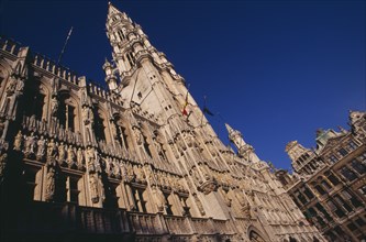 BELGIUM, Brabant, Brussels, The Grand Place.  Hotel de Ville.  Angled view of exterior facade
