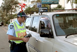 Australia, Queensland, The Gold Coast, Festive Police Breath Testing Driver