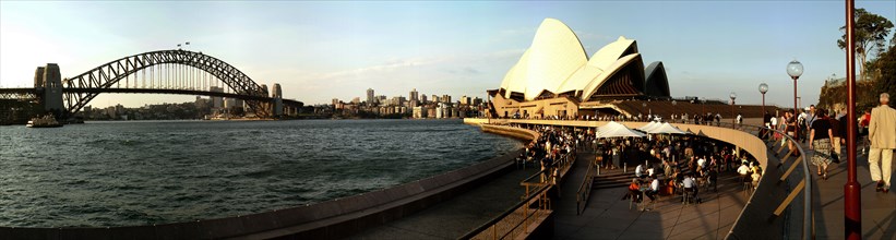 Australia, New South Wales, Sydney, Panorama Of Sydney Opera House And Harbour Bridge At Sunset