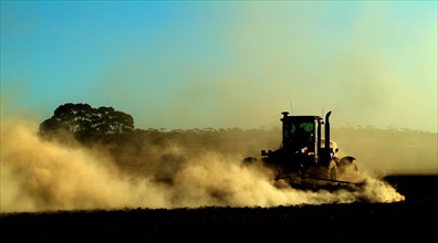 Australia, Western Australia, Wagin, Tractors Ploughing in the Drought