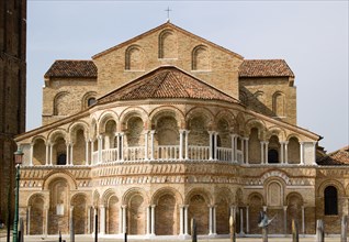 ITALY, Veneto, Venice, Murano Island The Colonnaded exterior of the 12th Century Basilica dei Santi