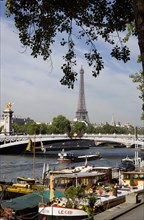 FRANCE, Ile de France, Paris, Houseboat barges moored alongside Port des Champs Elysees on the
