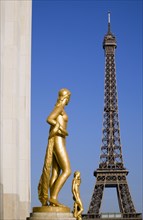 FRANCE, Ile de France, Paris, Gilded statues in the central square of the Palais de Chaillot with