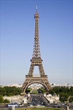 FRANCE, Ile de France, Paris, The Eiffel Tower with traffic crossing the Pont D’Ienta bridge across