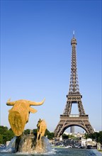 FRANCE, Ile de France, Paris, Fountain sculpture of cow and calf in the Trocadero Gardens with the
