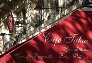 FRANCE, Ile de France, Paris, Cafe Tabac sign and pavement awning