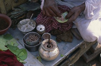 INDIA, North, Markets, Cropped shot of paan seller.