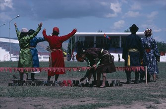 MONGOLIA, Sport, National Day archery contest.  Target line with red marking the bullseye and