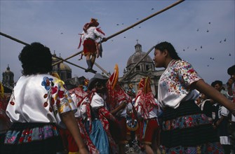 MEXICO, Mexico City, "Our Lady of Guadelope Festival dancers, musicians and acrobats in front of