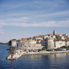 CROATIA, Korcula, View over the ancient walled town and harbour entrance.